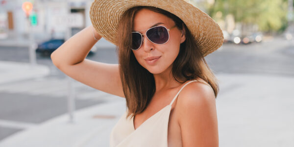 Beautiful young woman with hat - Anti Aging and Skin Rejuvenation Vitalogy Wellness and Medical Spa